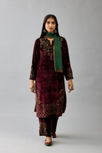 Maroon silk velvet straight mid length kurta with all-over hand block print, highlighted with beads, sequins and zari work at neck & hem.