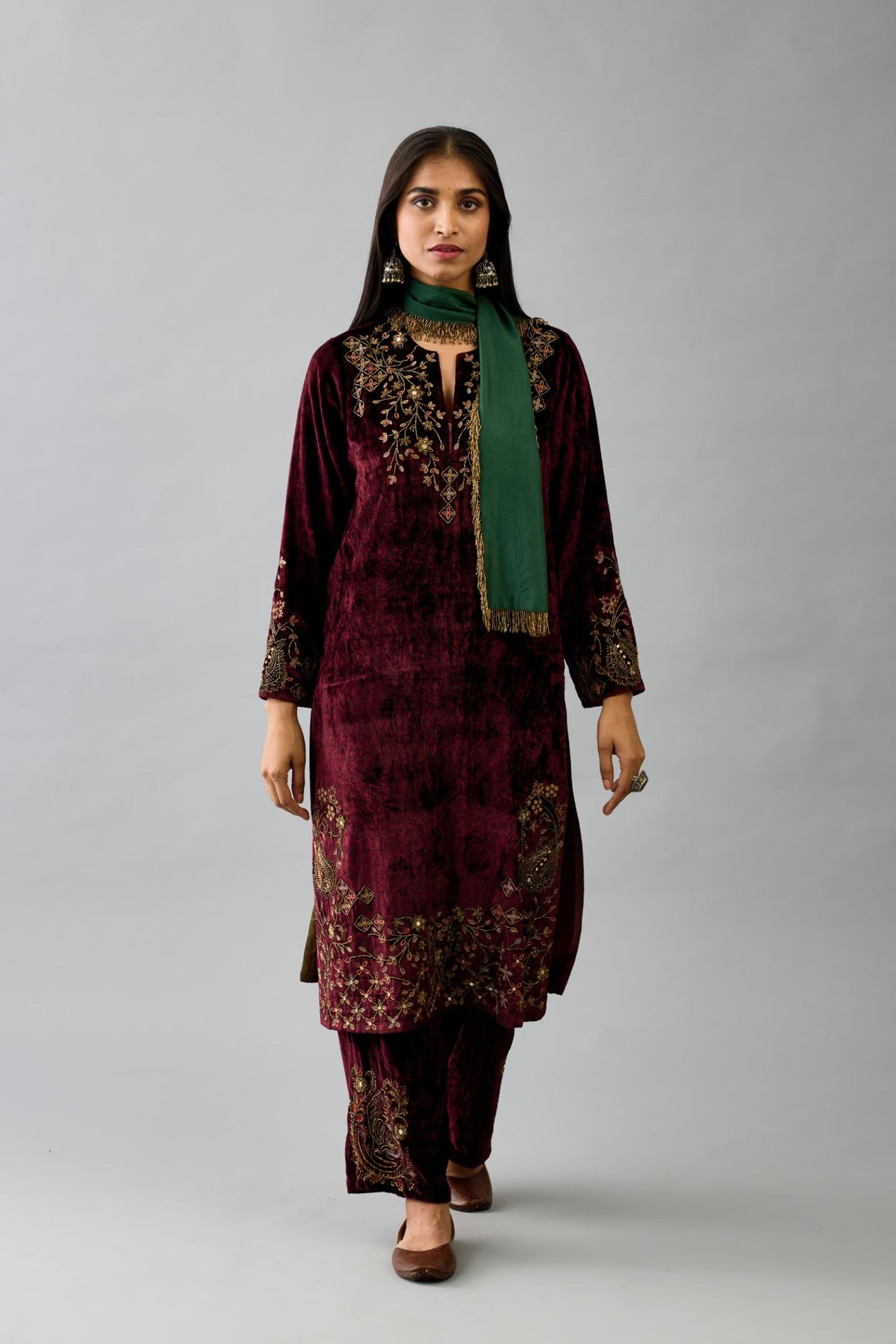 Maroon silk velvet straight mid length kurta with all-over hand block print, highlighted with beads, sequins and zari work at neck & hem.