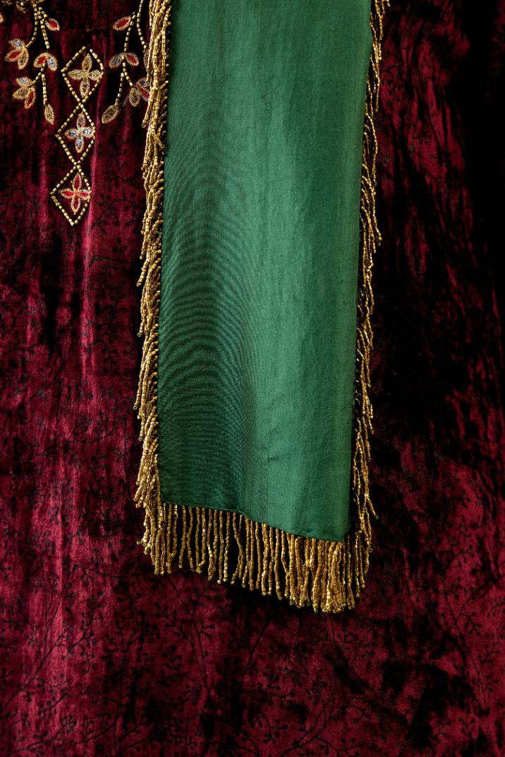 Maroon silk velvet straight mid length kurta with all-over hand block print, highlighted with beads, sequins and zari work at neck & hem.