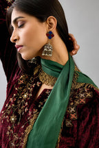 Maroon silk velvet straight mid length kurta with all-over hand block print, highlighted with beads, sequins and zari work at neck & hem.