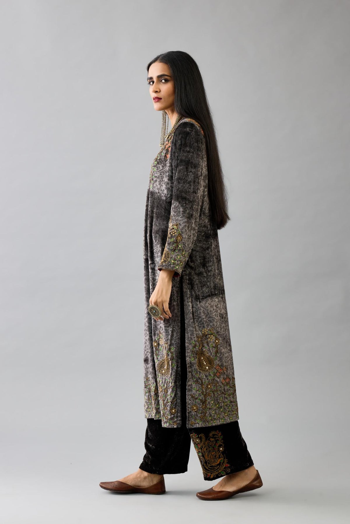 Grey silk velvet straight mid length kurta with all-over hand block print, highlighted with beads, sequins and zari work at neck & hem.