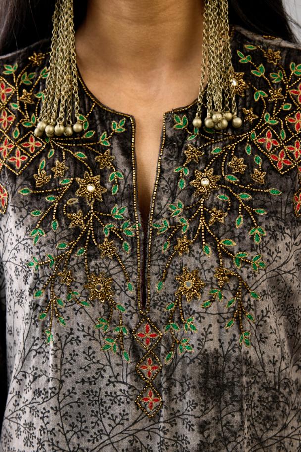 Grey silk velvet straight mid length kurta with all-over hand block print, highlighted with beads, sequins and zari work at neck & hem.