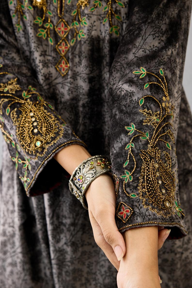 Grey silk velvet straight mid length kurta with all-over hand block print, highlighted with beads, sequins and zari work at neck & hem.