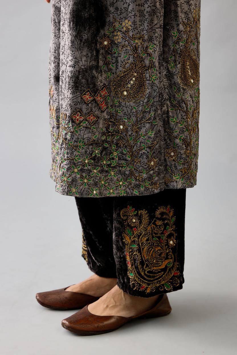 Grey silk velvet straight mid length kurta with all-over hand block print, highlighted with beads, sequins and zari work at neck & hem.
