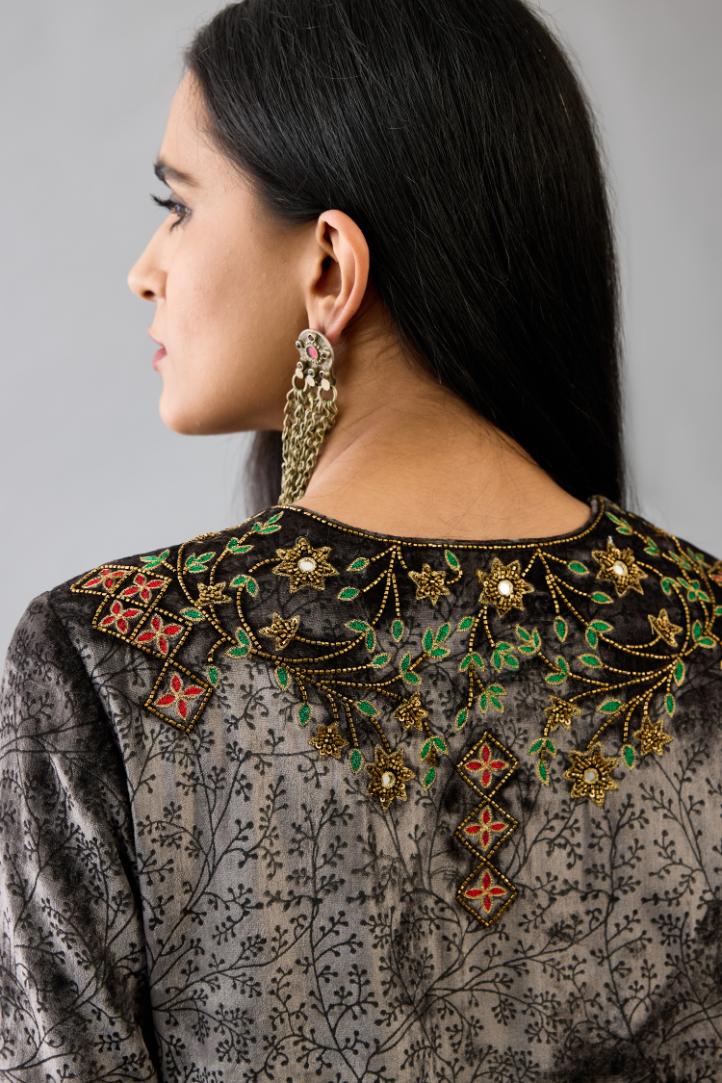 Grey silk velvet straight mid length kurta with all-over hand block print, highlighted with beads, sequins and zari work at neck & hem.