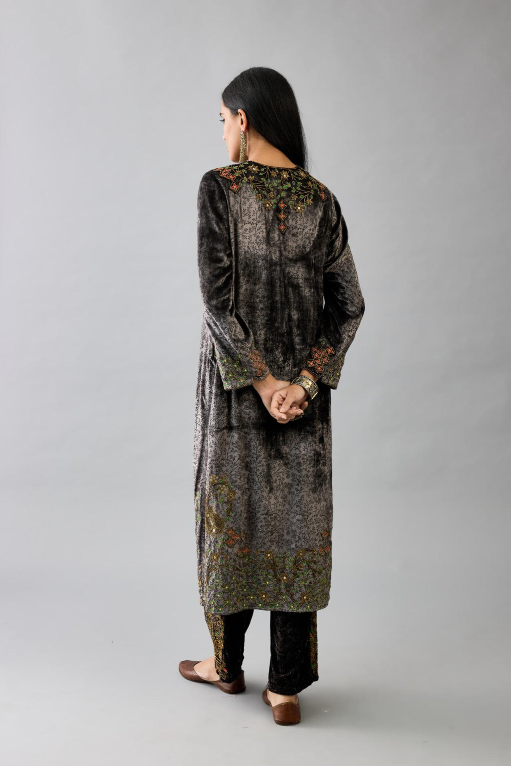 Grey silk velvet straight mid length kurta with all-over hand block print, highlighted with beads, sequins and zari work at neck & hem.