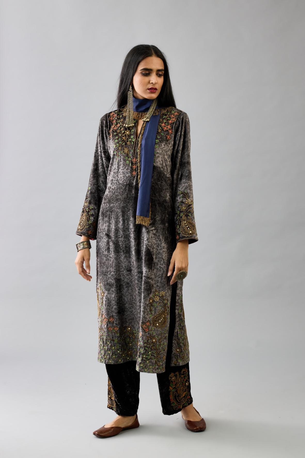 Grey silk velvet straight mid length kurta with all-over hand block print, highlighted with beads, sequins and zari work at neck & hem.