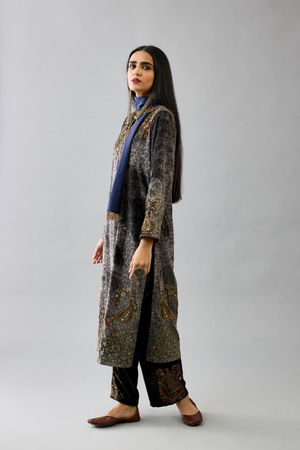 Grey silk velvet straight mid length kurta with all-over hand block print, highlighted with beads, sequins and zari work at neck & hem.