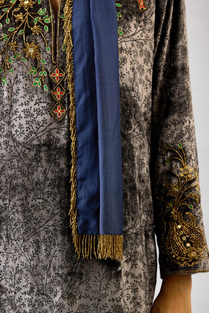 Grey silk velvet straight mid length kurta with all-over hand block print, highlighted with beads, sequins and zari work at neck & hem.