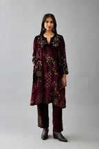 Maroon silk velvet short easy fit kurta set with straight hem and all-over hand block print, highlighted with beads, sequins and zari work.