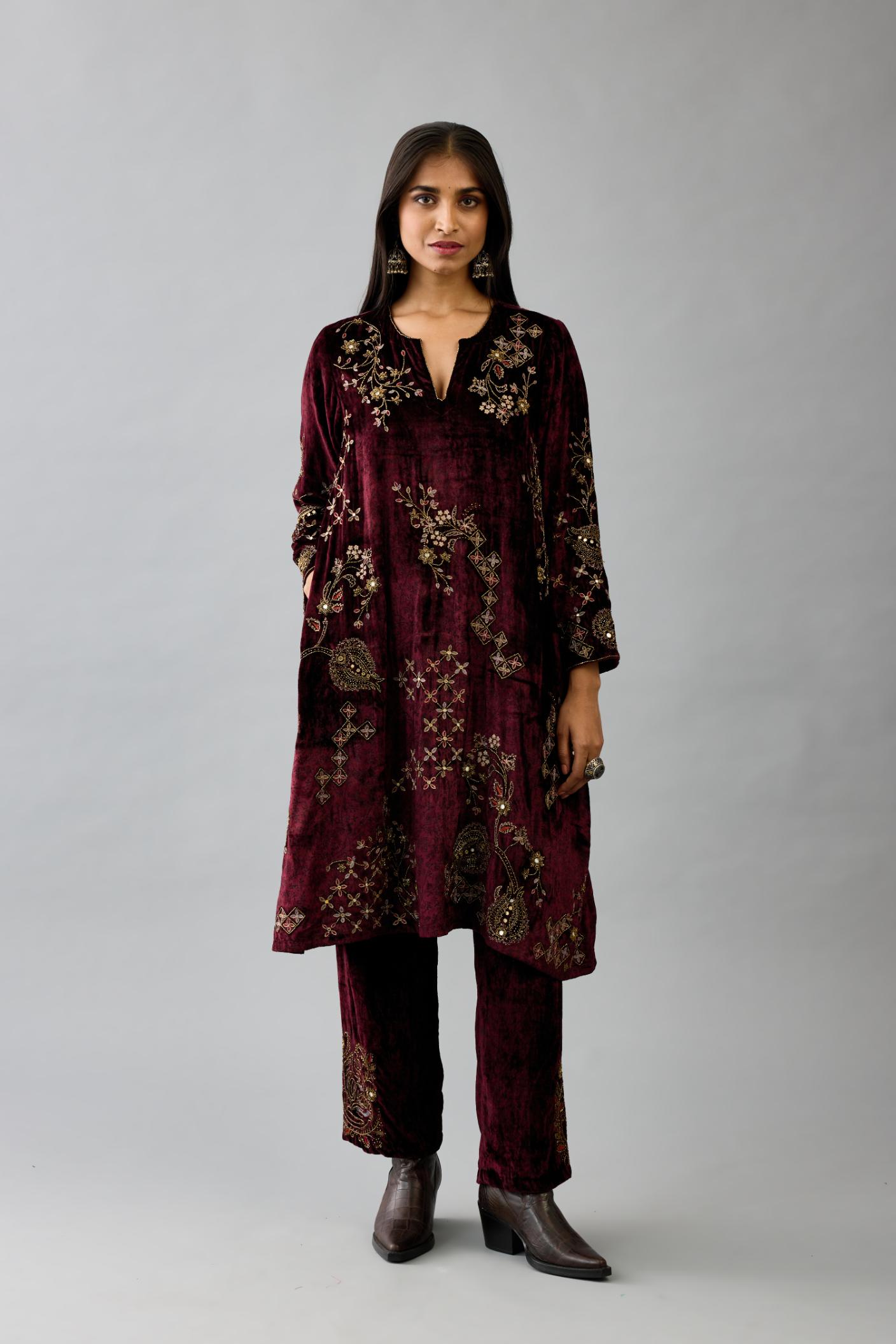 Maroon silk velvet short easy fit kurta set with straight hem and all-over hand block print, highlighted with beads, sequins and zari work.
