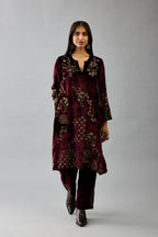 Maroon silk velvet short easy fit kurta set with straight hem and all-over hand block print, highlighted with beads, sequins and zari work.