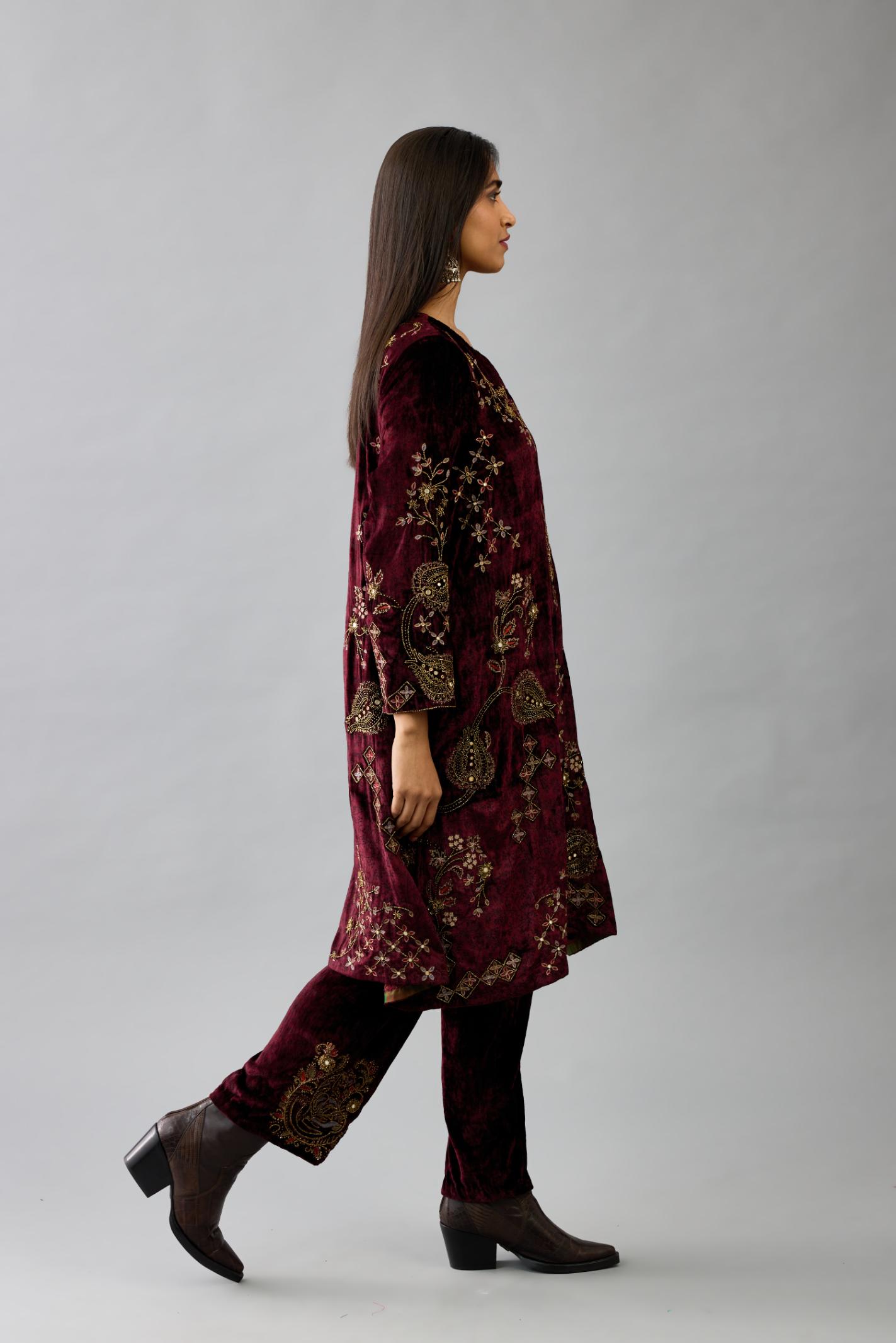 Maroon silk velvet short easy fit kurta set with straight hem and all-over hand block print, highlighted with beads, sequins and zari work.