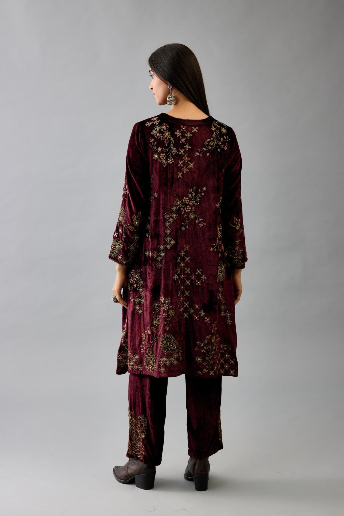 Maroon silk velvet short easy fit kurta set with straight hem and all-over hand block print, highlighted with beads, sequins and zari work.
