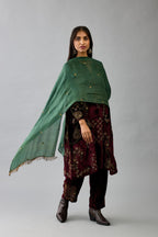 Maroon silk velvet short easy fit kurta set with straight hem and all-over hand block print, highlighted with beads, sequins and zari work.