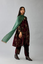 Green light silk stole with all-over small embroidered booti and fringes at sides.