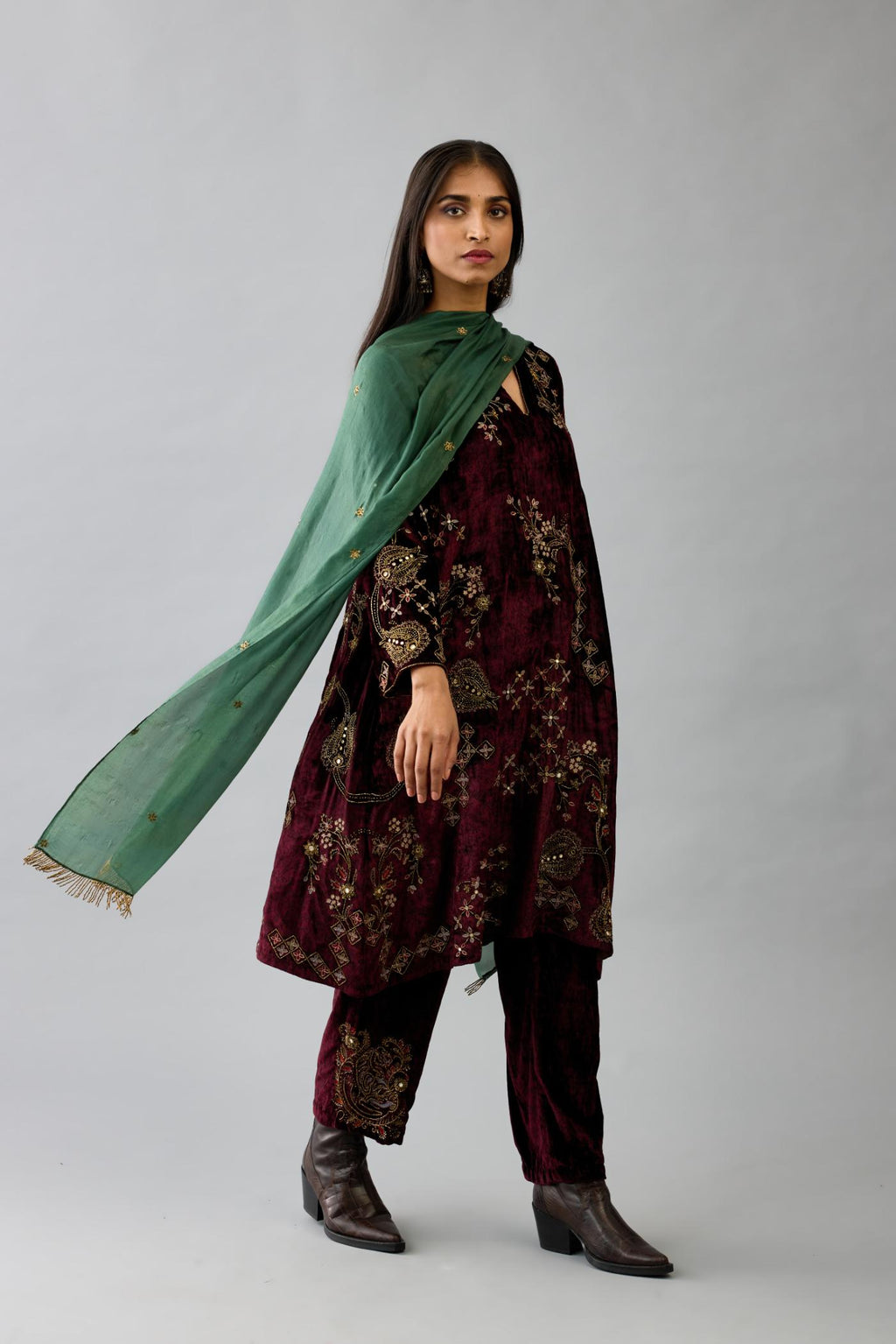 Maroon silk velvet short easy fit kurta set with straight hem and all-over hand block print, highlighted with beads, sequins and zari work.