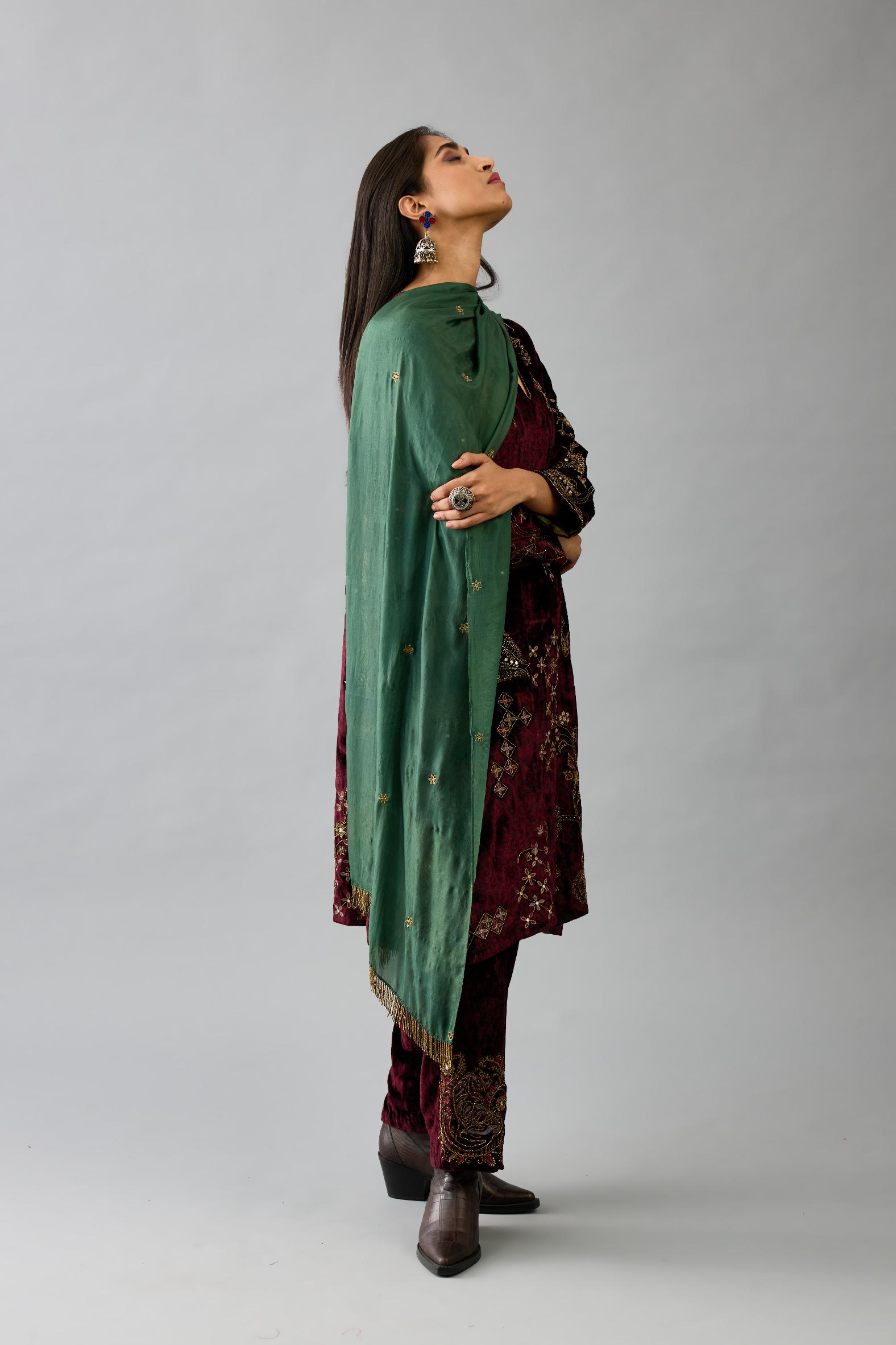 Maroon silk velvet short easy fit kurta set with straight hem and all-over hand block print, highlighted with beads, sequins and zari work.