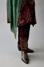 Green light silk stole with all-over small embroidered booti and fringes at sides.