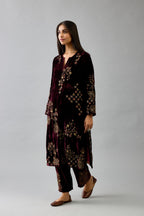 Maroon silk velvet straight mid length kurta with all-over hand block print, highlighted with beads, sequins and zari work.