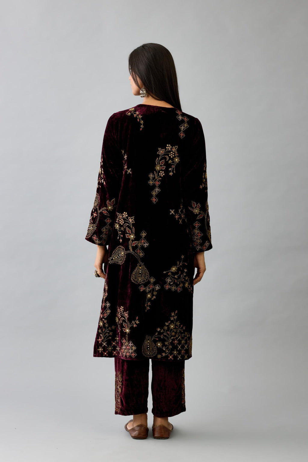 Maroon silk velvet straight mid length kurta with all-over hand block print, highlighted with beads, sequins and zari work.