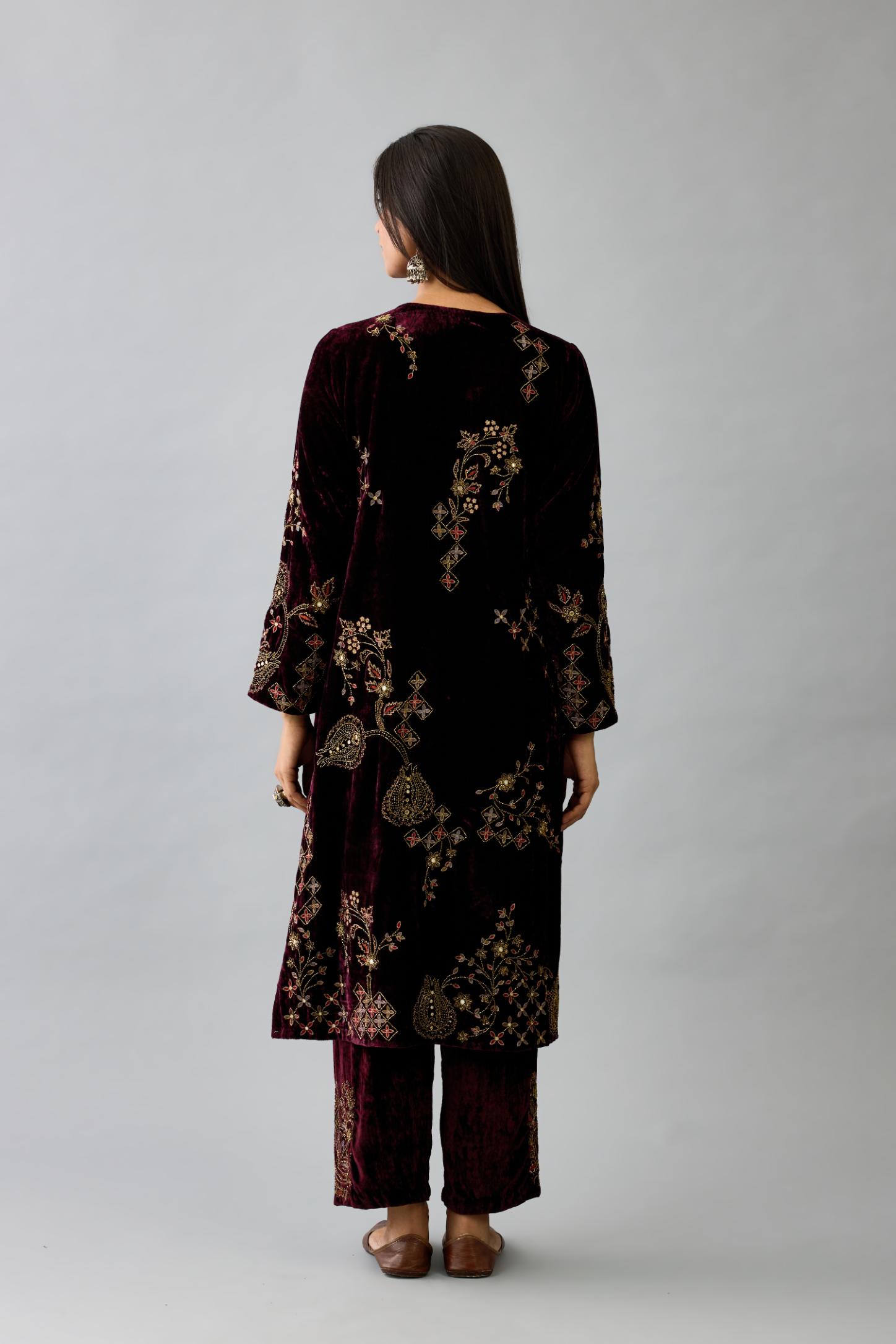 Maroon silk velvet straight mid length kurta with all-over hand block print, highlighted with beads, sequins and zari work.
