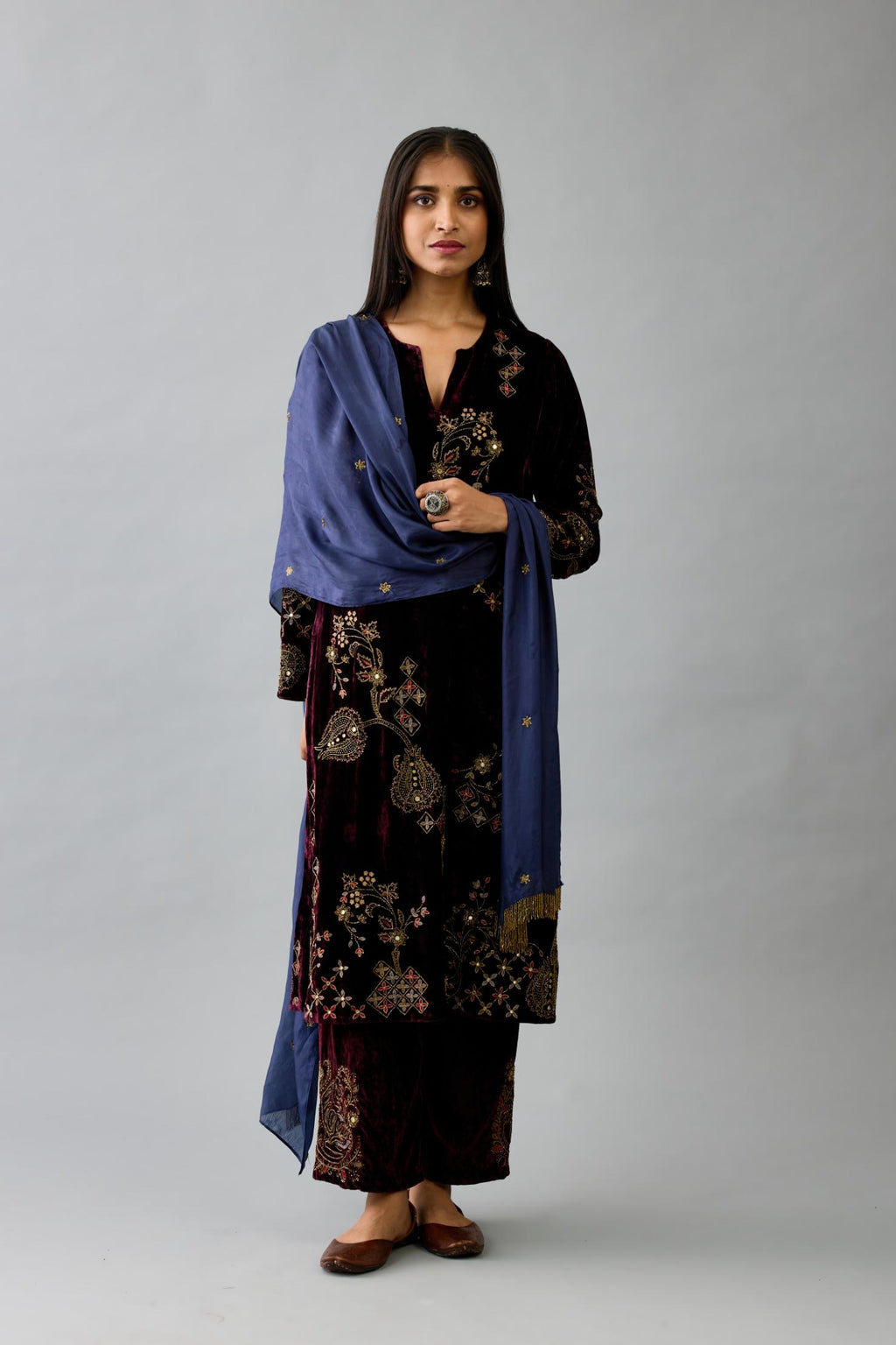 Maroon silk velvet straight mid length kurta with all-over hand block print, highlighted with beads, sequins and zari work.