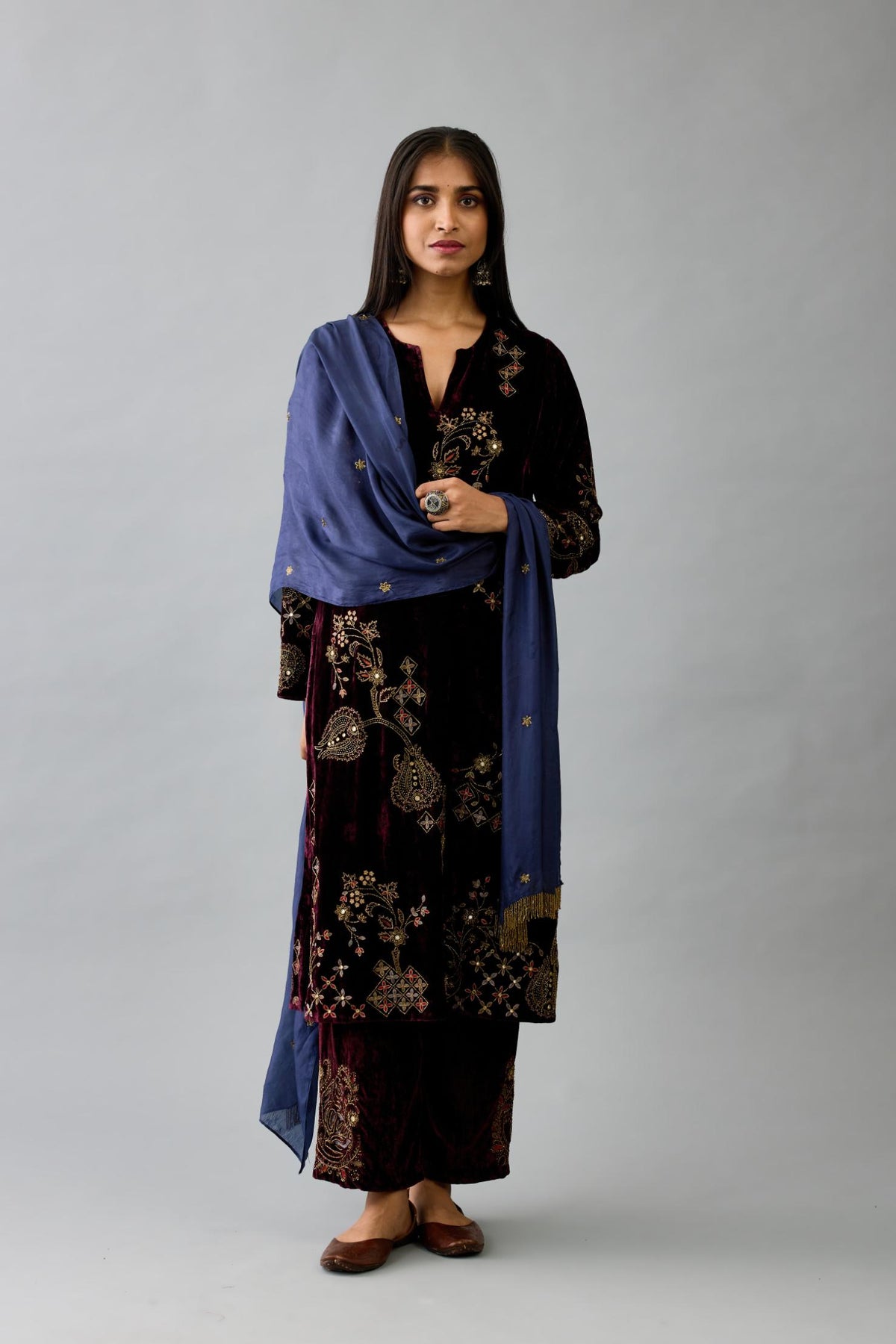 Maroon silk velvet straight mid length kurta with all-over hand block print, highlighted with beads, sequins and zari work.