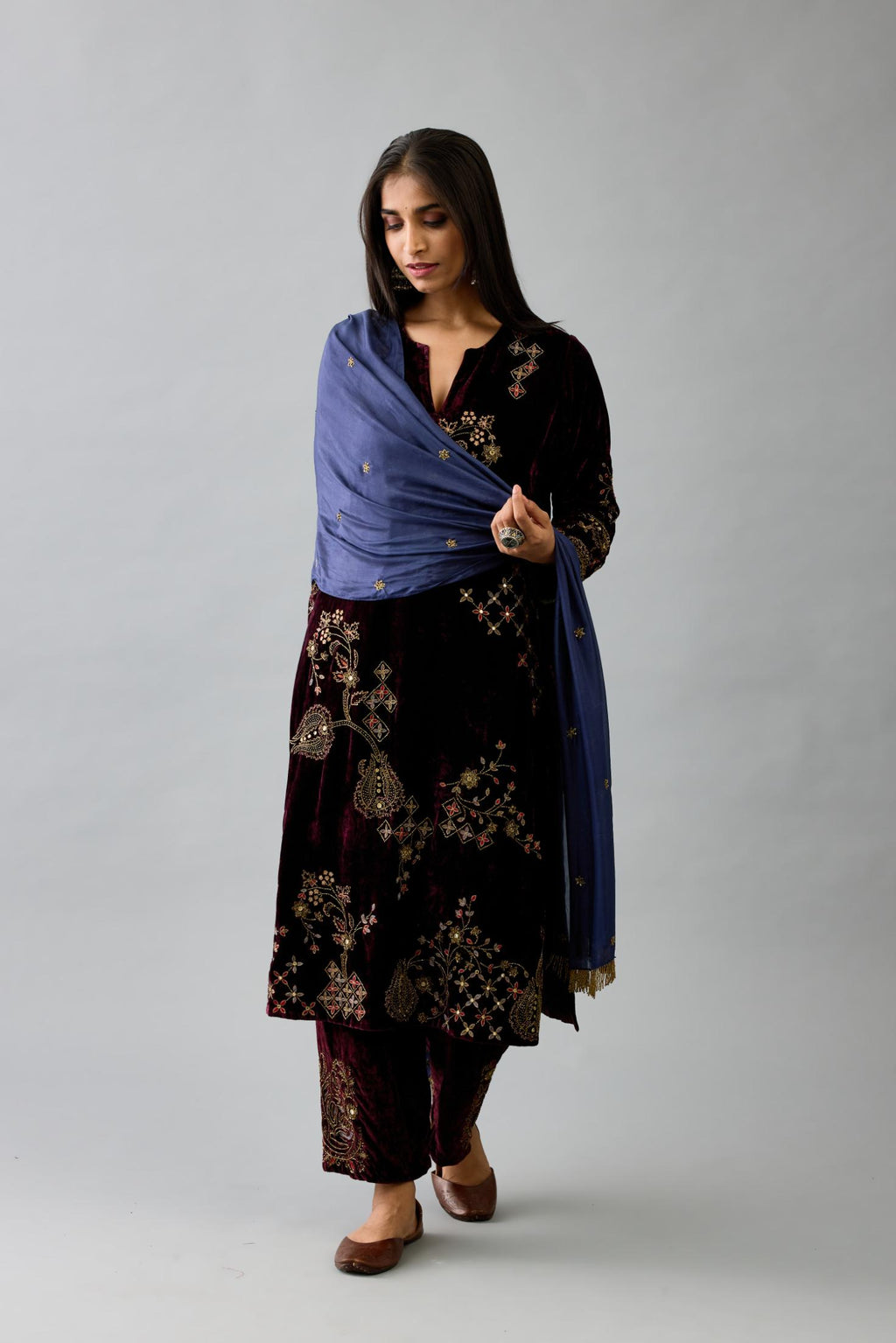Maroon silk velvet straight mid length kurta with all-over hand block print, highlighted with beads, sequins and zari work.