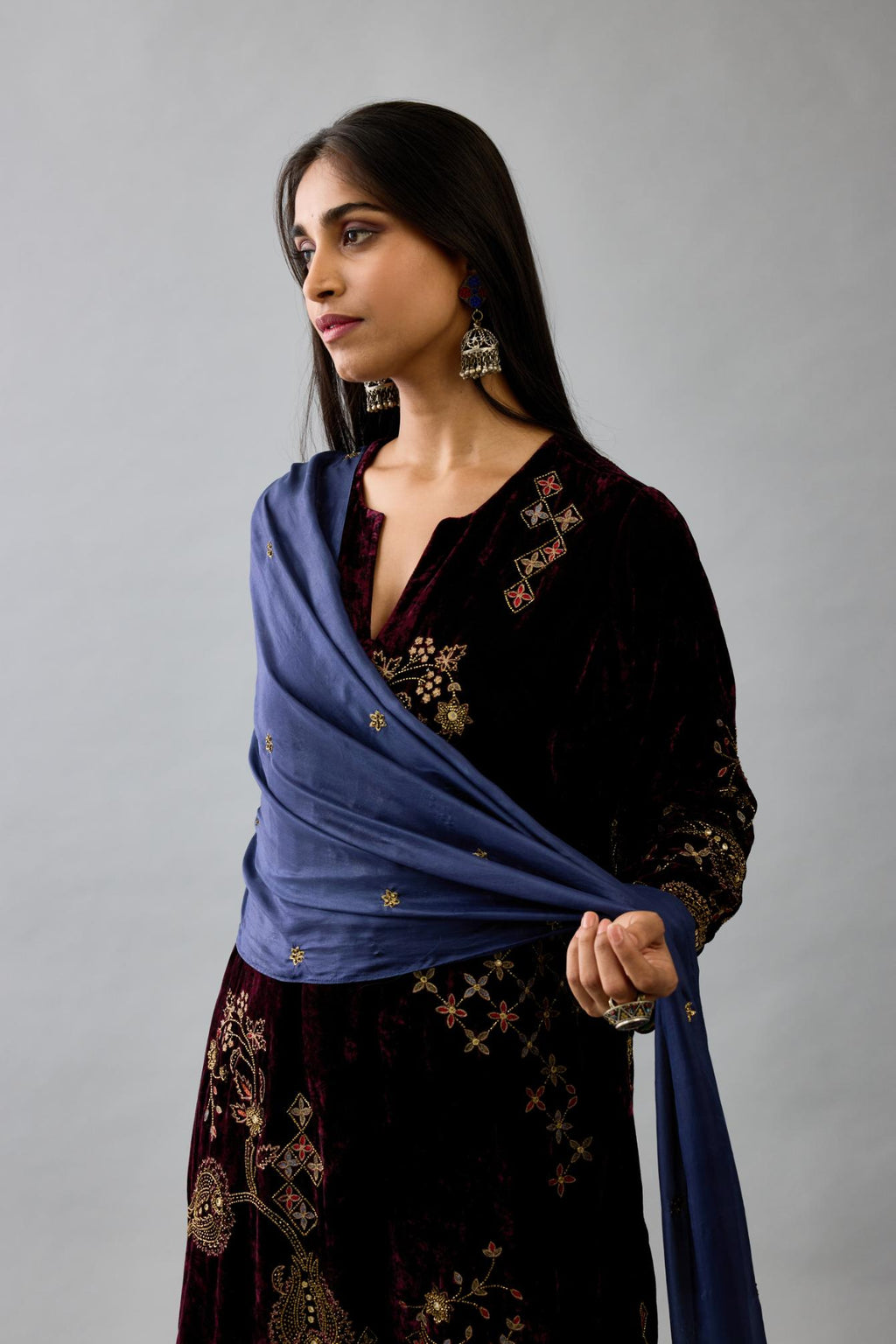 Maroon silk velvet straight mid length kurta with all-over hand block print, highlighted with beads, sequins and zari work.