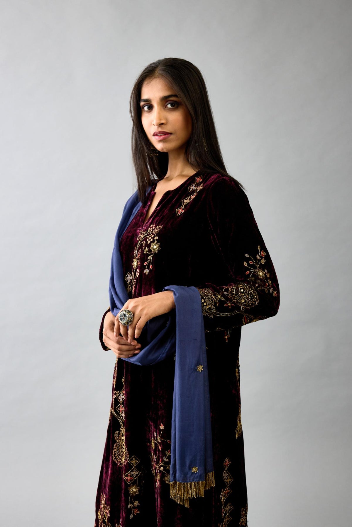 Maroon silk velvet straight mid length kurta with all-over hand block print, highlighted with beads, sequins and zari work.