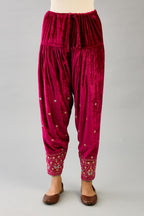 Fuchsia silk velvet narrow salwar with dori and contrast silk thread embroidery,  detailed with gold sequins work.