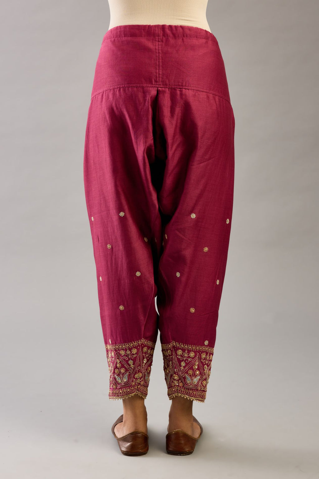 Wine silk chanderi narrow salwar with dori and contrast silk thread embroidery,  detailed with gold sequins work.