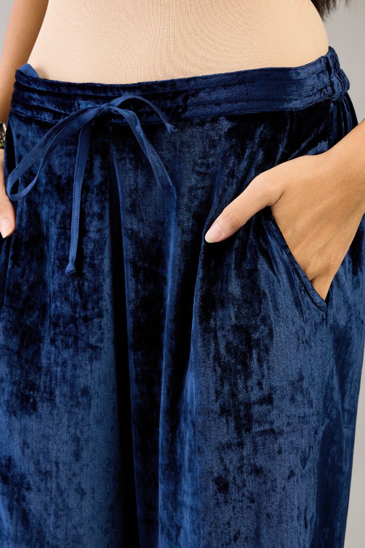 Blue silk velvet straight pants.