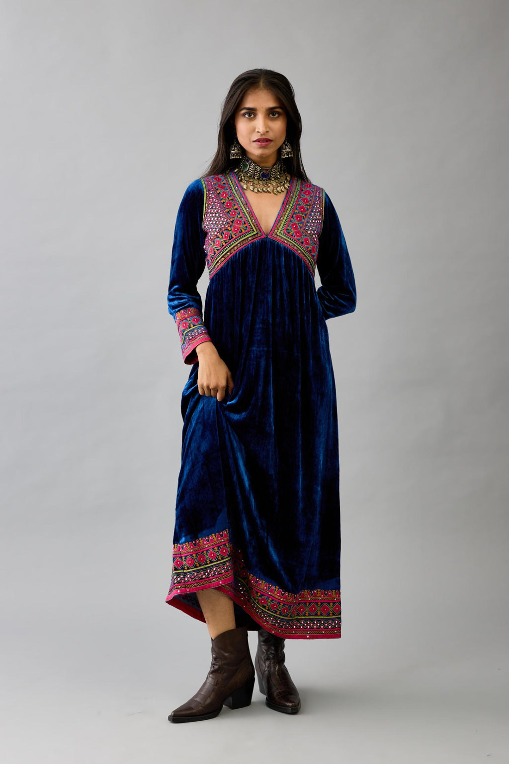 Blue silk velvet embroidered kurta dress with V neck, yoke and fine gathers at empire line.