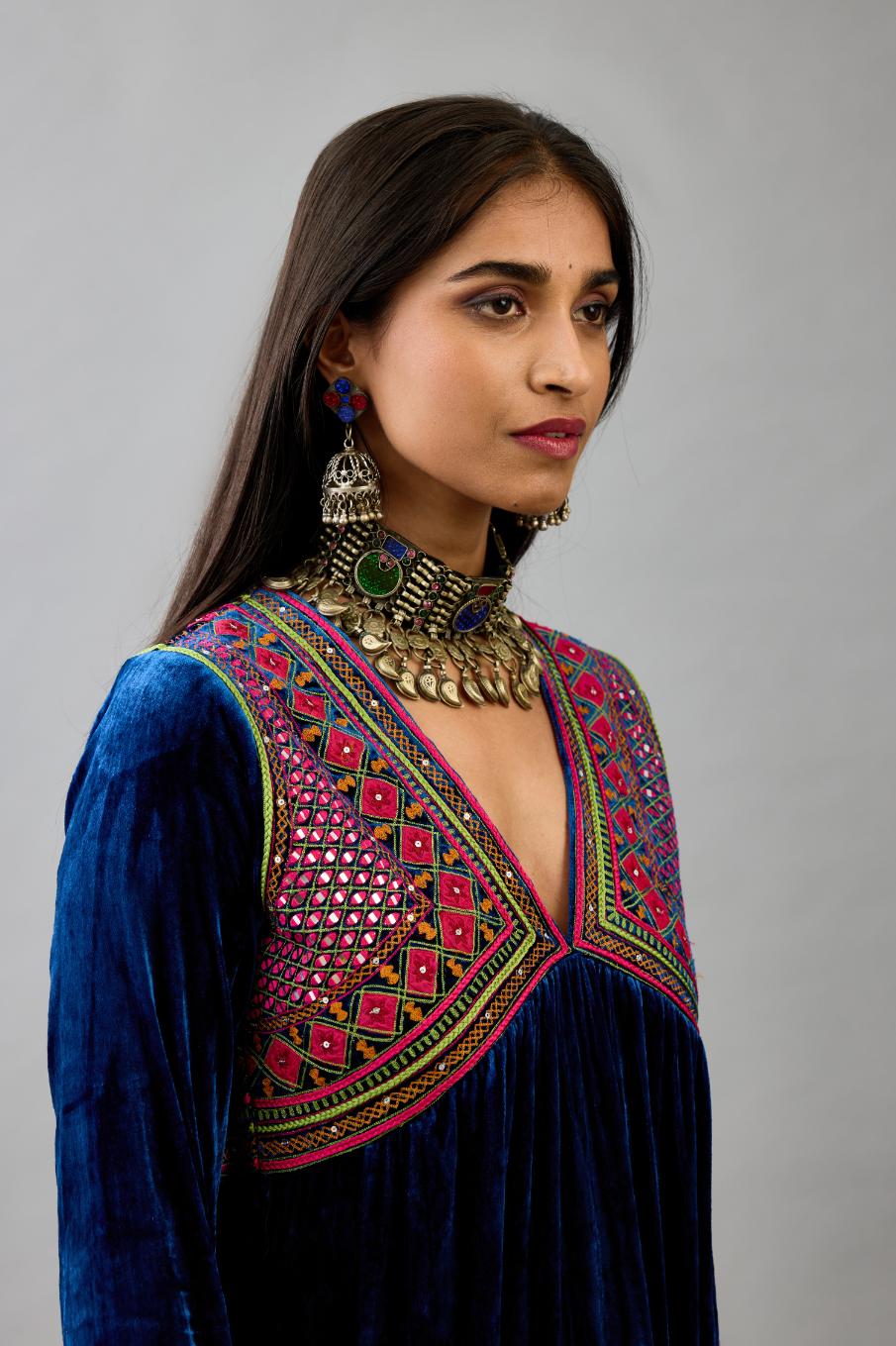 Blue silk velvet embroidered kurta dress with V neck, yoke and fine gathers at empire line.