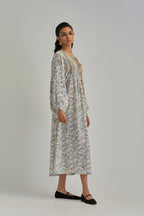 Off White dress with all-over earthy coloured hand block print and Aari thread work yoke.