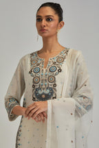 Off White silk organza dupatta with appliqué work and earthy coloured flower embroidery all-over the dupatta.