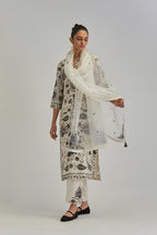 Off White straight kurta set, fully embroidered with bold appliqué flowers, earthy-coloured Aari thread work and silk tassels.
