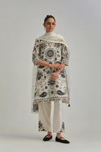 Off White short A-line silk Chanderi kurta set, fully embroidered with earthy coloured appliqué with Aari thread work and silk tassels.