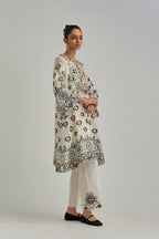 Off White silk Chanderi straight hem mid-length abha style kurta set with bold appliqué embroidery along with earthy-coloured Aari thread work and tassels.