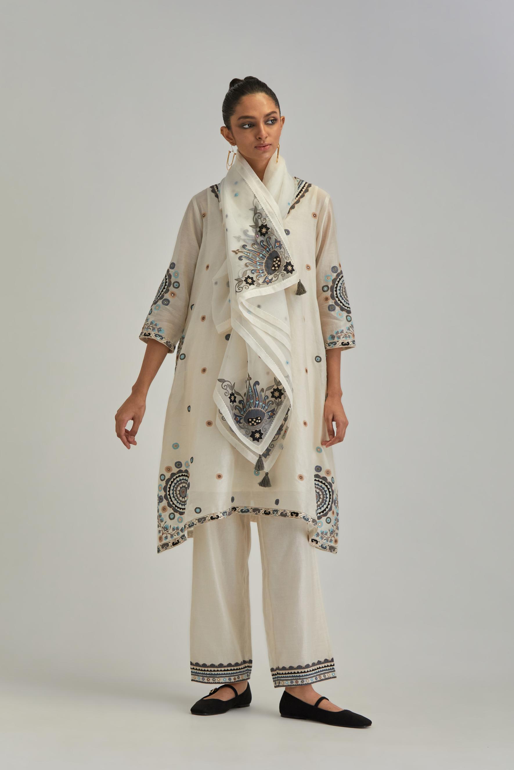 Off White silk Chanderi short V-neck kurta set, with straight hem and side pockets, decorated with fine appliqué and Aari thread embroidery.