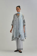Blue silk Chanderi short V-neck kurta set, with straight hem and side pockets, decorated with fine appliqué and Aari thread embroidery.