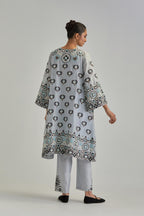 Blue silk Chanderi straight hem mid-length abha style kurta set with bold appliqué embroidery along with earthy-coloured Aari thread work and tassels.