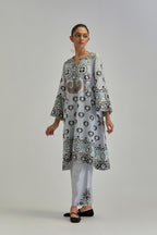 Blue silk Chanderi straight hem mid-length abha style kurta set with bold appliqué embroidery along with earthy-coloured Aari thread work and tassels.