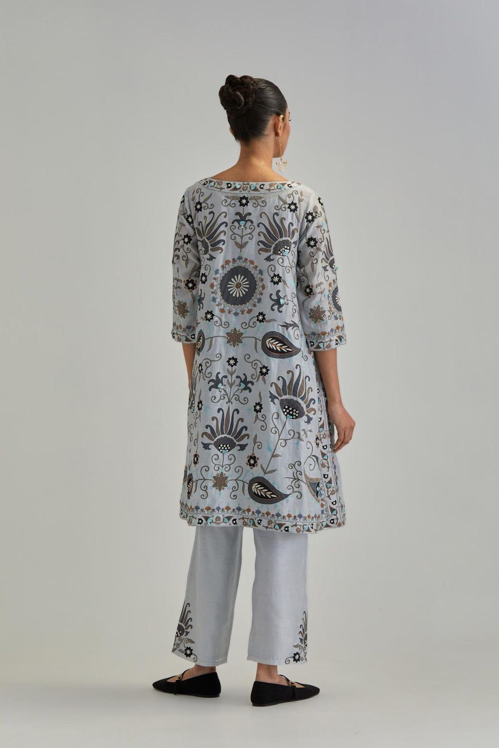 Blue short A-line silk Chanderi kurta set, fully embroidered with earthy coloured appliqué with Aari thread work and silk tassels.