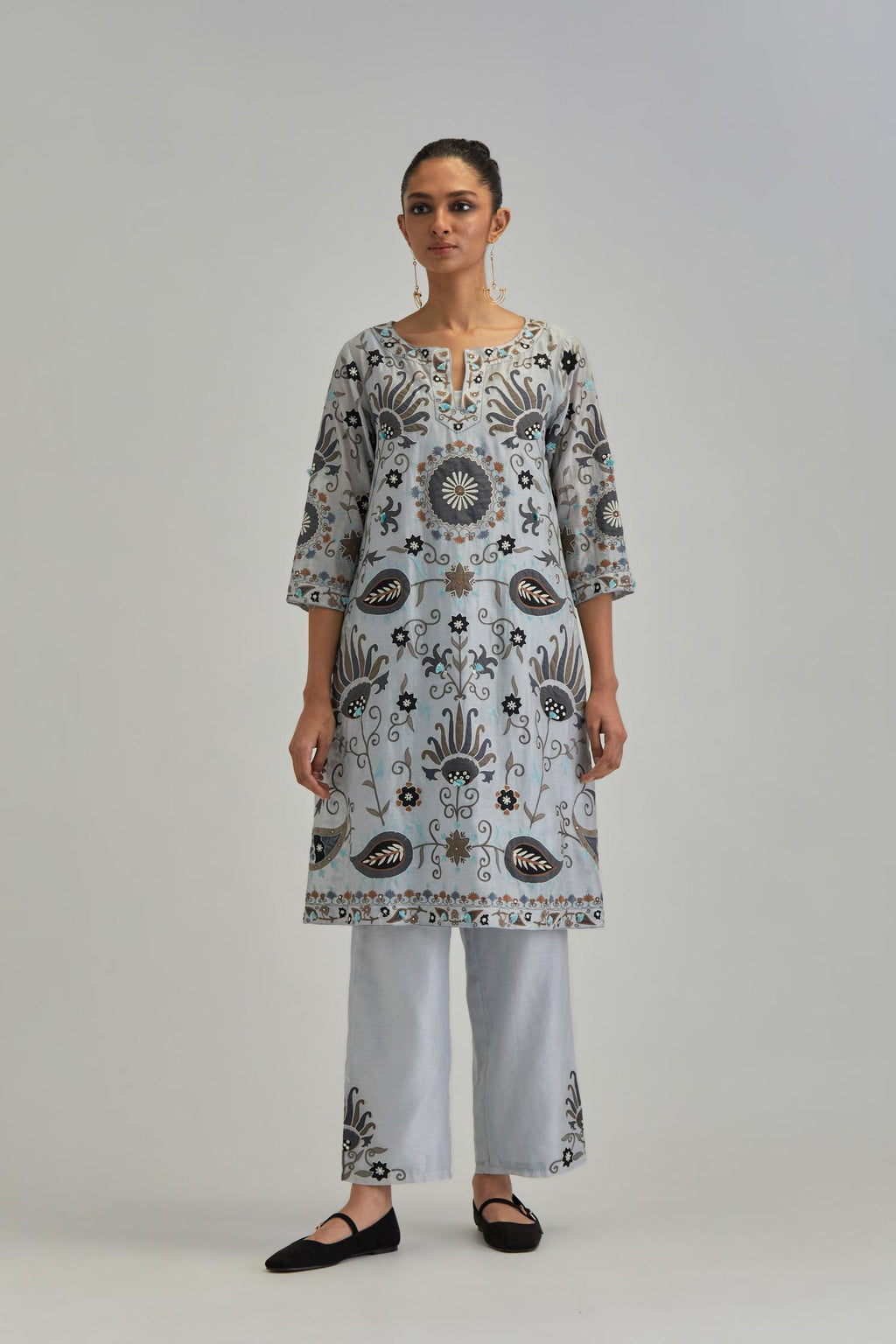Blue short A-line silk Chanderi kurta set, fully embroidered with earthy coloured appliqué with Aari thread work and silk tassels.