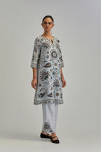 Blue short A-line silk Chanderi kurta set, fully embroidered with earthy coloured appliqué with Aari thread work and silk tassels.