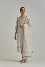 Off white cotton Chanderi dupatta with scalloped and embroidered edges.