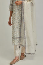 Off white cotton Chanderi dupatta with scalloped and embroidered edges.